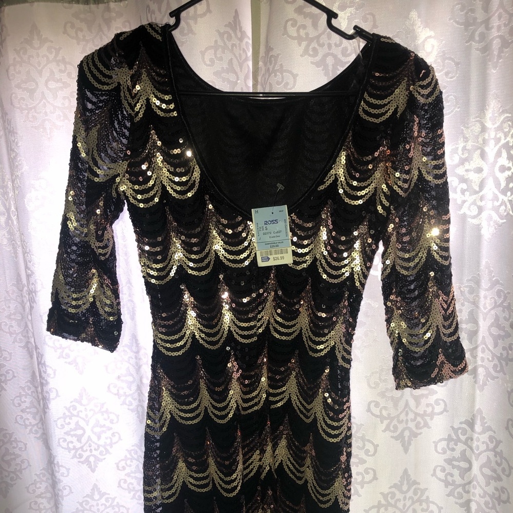 A sparkling black Mini Dress